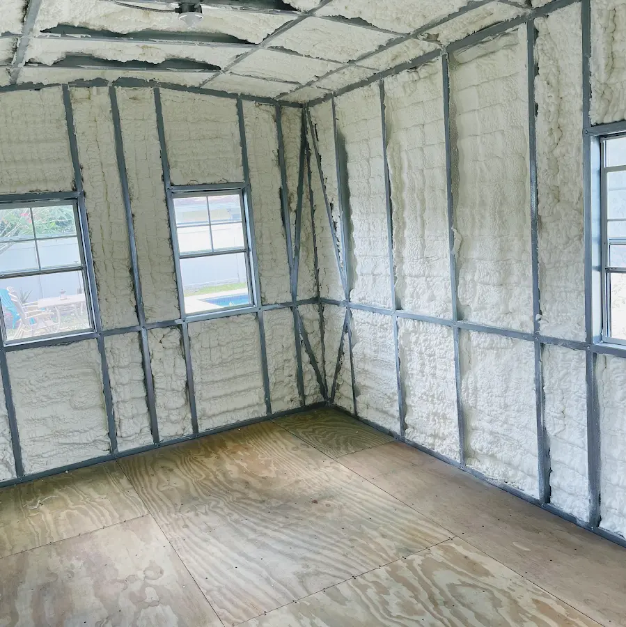 Closed-cell spray foam insulation applied to wall cavities in a residential project in Pequannock